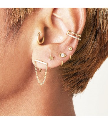 Goudkleurige dubbele earcuff met witte zirkoonsteentjes